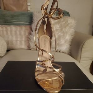 Gold charm heels